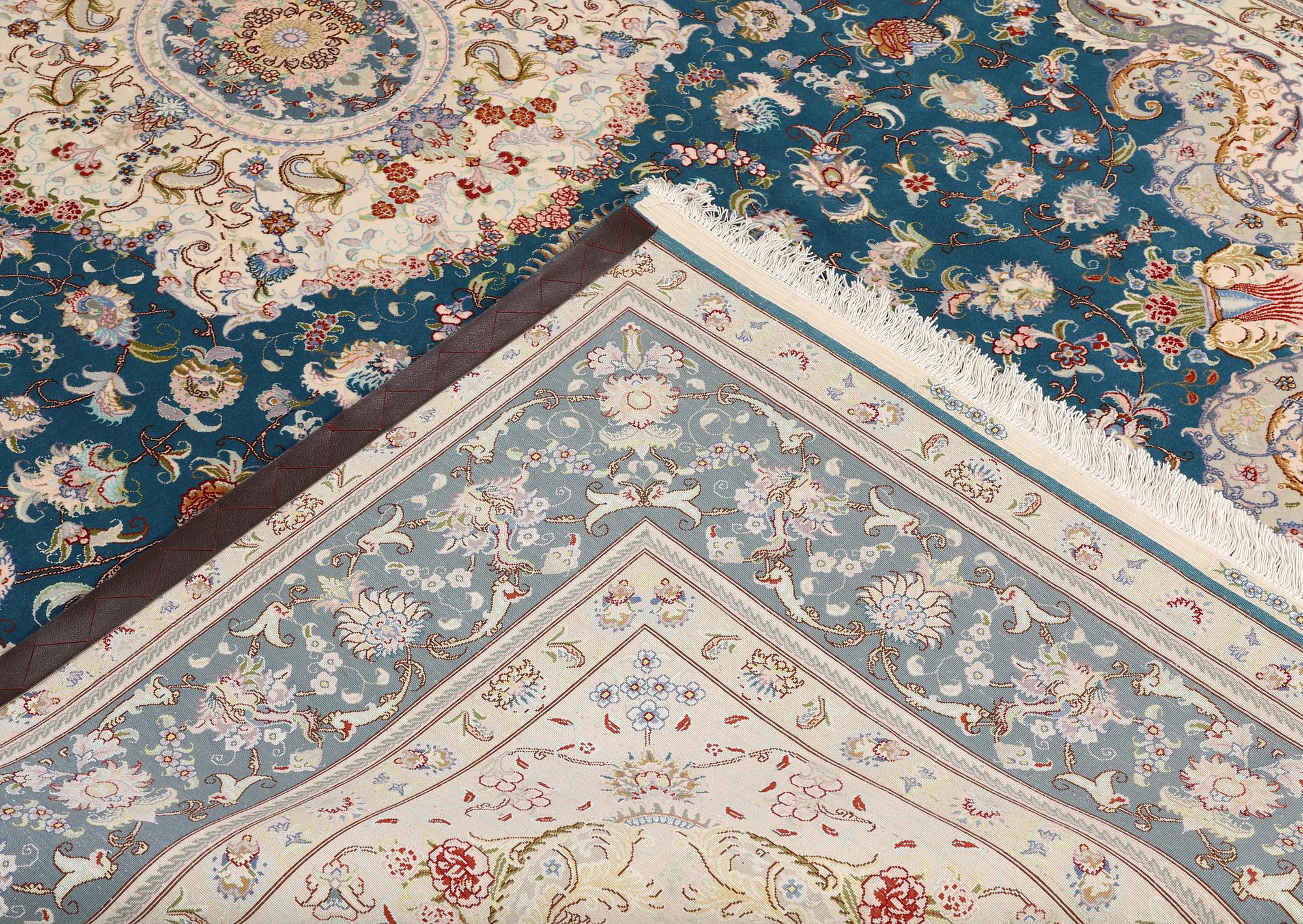 A part silk Tabriz carpet, so-called 50 Raj, approx. 306 x 200 cm.