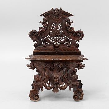 A Neorenaissance 'Sgabello' carved chair, late 19th century.