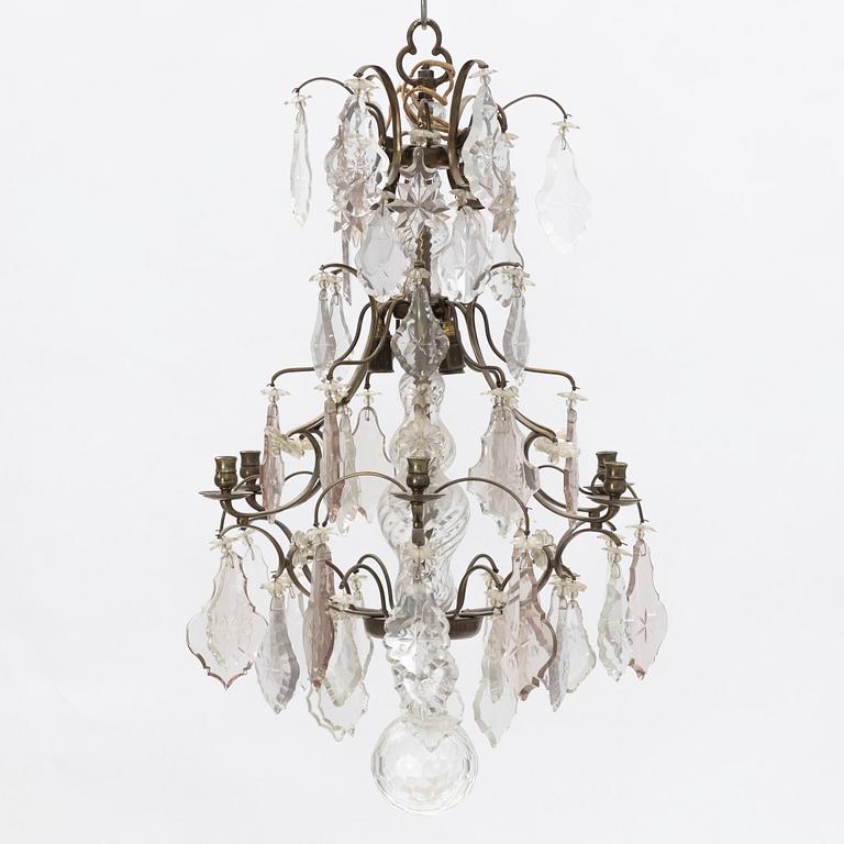 A six-light rococo-style chandelier, later part of the 20th century.