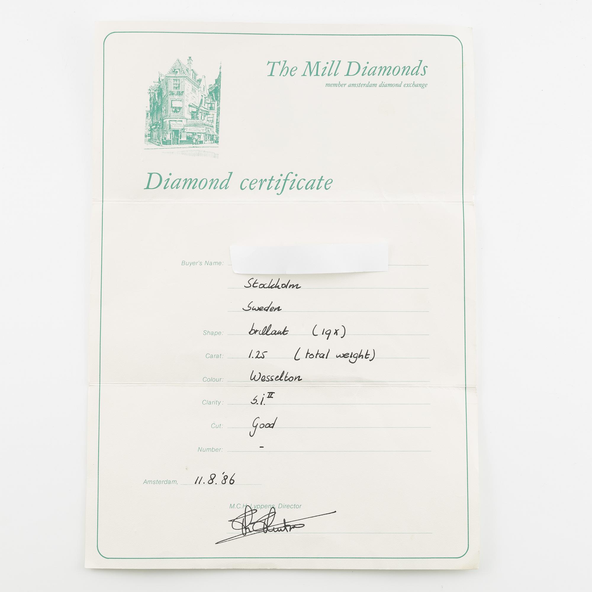 Ring 18K gold set with round brilliant-cut diamonds.