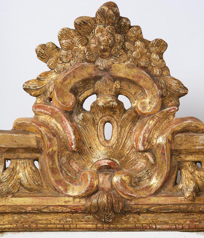 A Swedish rococo giltwood mirror, Stockholm, later part 18th century.