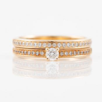 Vigselringar, ett par, Schalins, 18K guld med briljantslipade diamanter.