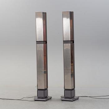 A pair of Bang & Olufsen speakers.