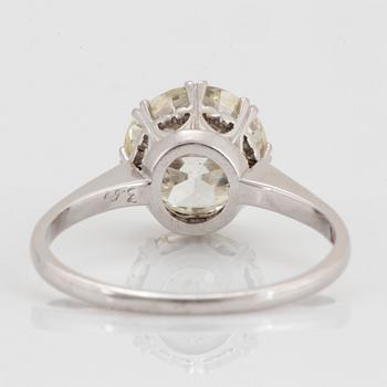 A platinum ring set with an old-cut diamond 3.50 cts according to engraving.