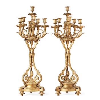 1286. A pair of Louis XVI-style circa 1900 seven-light candelabra.