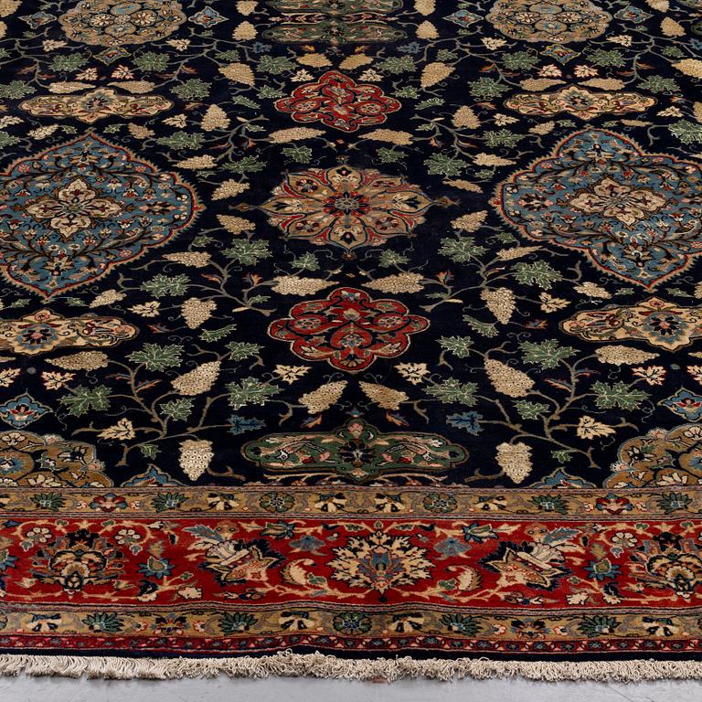 A CARPET so called Royal Kashan, part silk, signed, ca 483 x 311 cm.