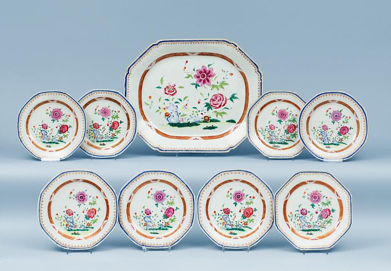 A set of eight famille rose dinner plates and a serving dish, Qing dynasty, Qianlong (1736-95).