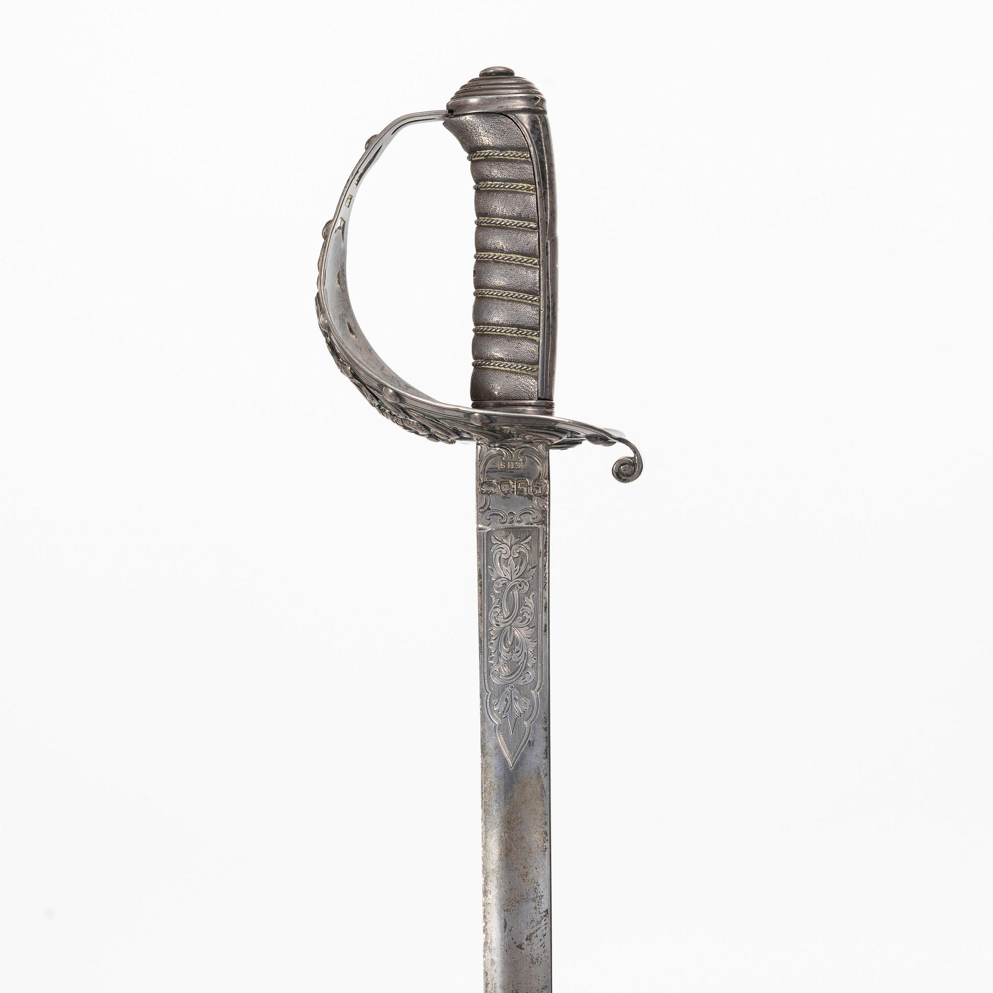 Edward H Stockwell, brevkniv i form av värja, silver, London 1873.