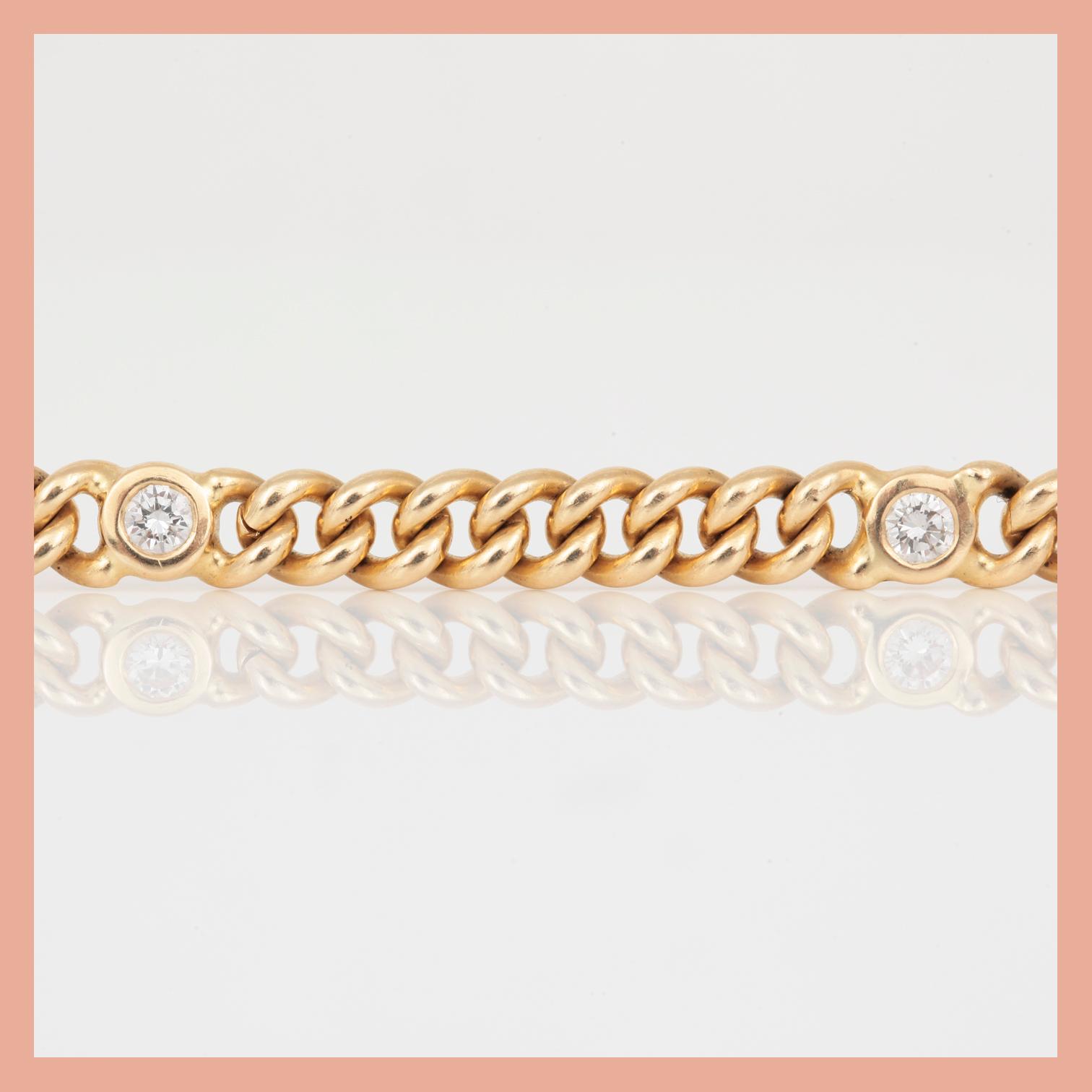ARMBAND, kedja med 5 st briljantslipade diamanter, ca 0.80 ct totalt.