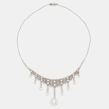 416. A platinum necklace set with old- and rose-cut diamonds.