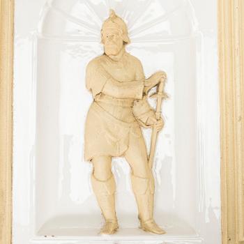 Reliefi / koriste-elementti kakluuniin Wilhelm Andstén, Helsinki, 1800-luvun loppu.