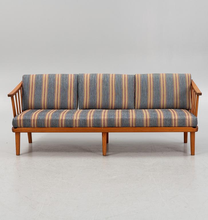 Carl Malmsten, a 'Visningsö' pina sofa.