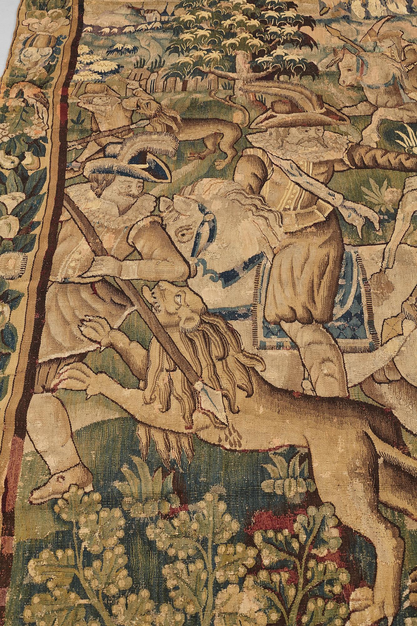 A TAPESTRY, "Lion hunting", tapestry weave, Flanders the middle of the 17th century, possibly Oudenarde, ca 262 x 249 cm.