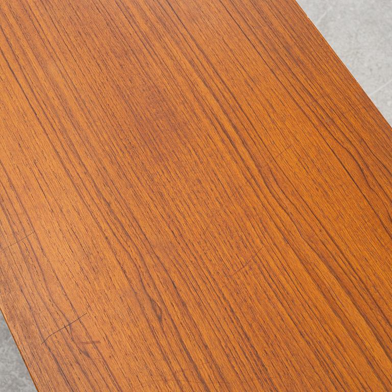 A 1950's teak veneered sideboard.