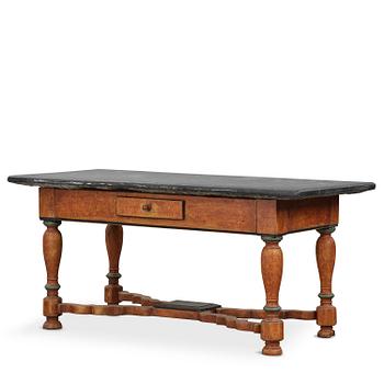 24. A 'Komstad' limestone-top table from Scania, Sweden, 19th century.
