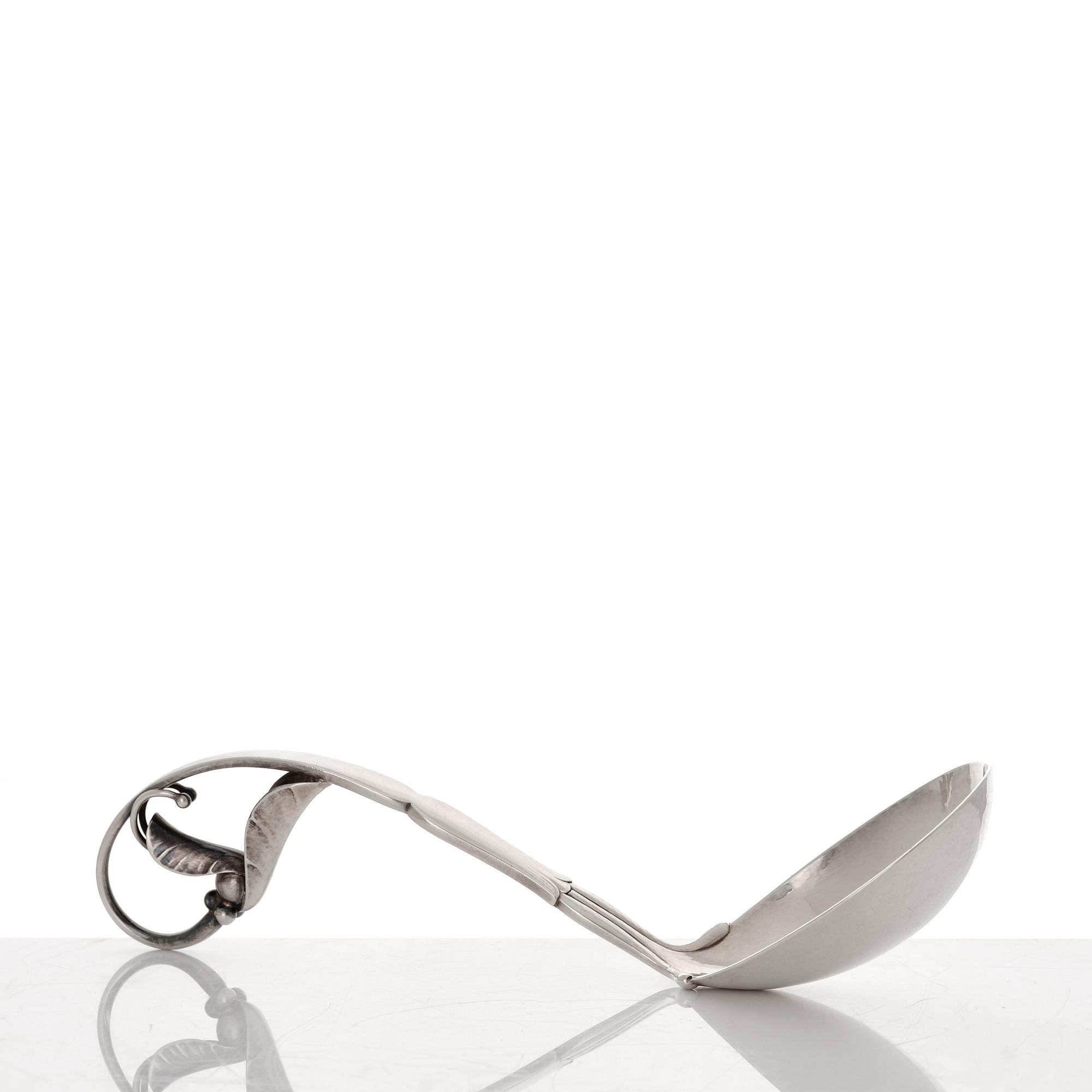 Georg Jensen, a sterling silver sauceboat and ladle, Copenhagen 1925-1945, design nr 98 and 141.