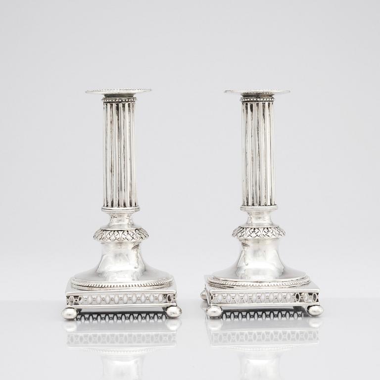 A pair of Swedish Gustavian silver candlesticks, mark of Mikael Nyberg, Stockholm 1795.