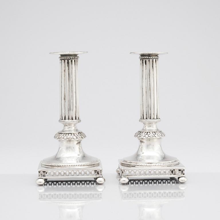 A pair of Swedish Gustavian silver candlesticks, mark of Mikael Nyberg, Stockholm 1795.