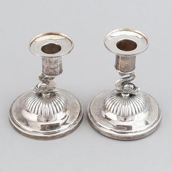 A pair of swedish silver empire candlesticks, mark of Johan Petter Grönvall, Stockholm 1830.