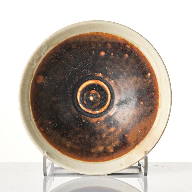 A brown and white glazed bowl, Song dynasty (960-1279).