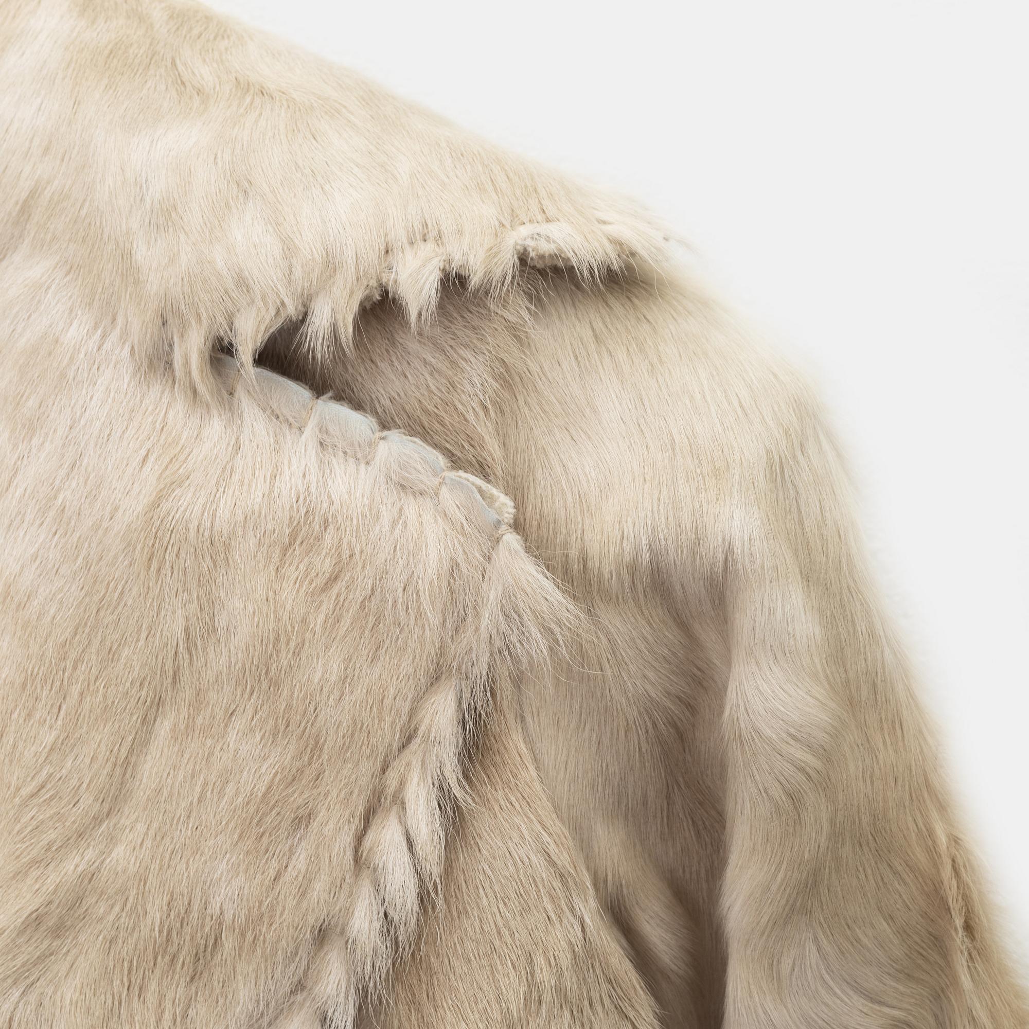 Lanvin, a goat fur jacket with belt, size 34.