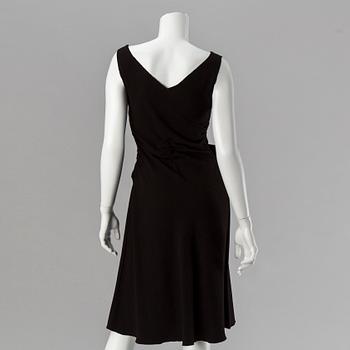 A black dress by Prada.