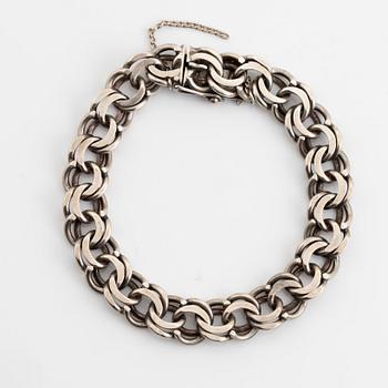 Silver bracelet.