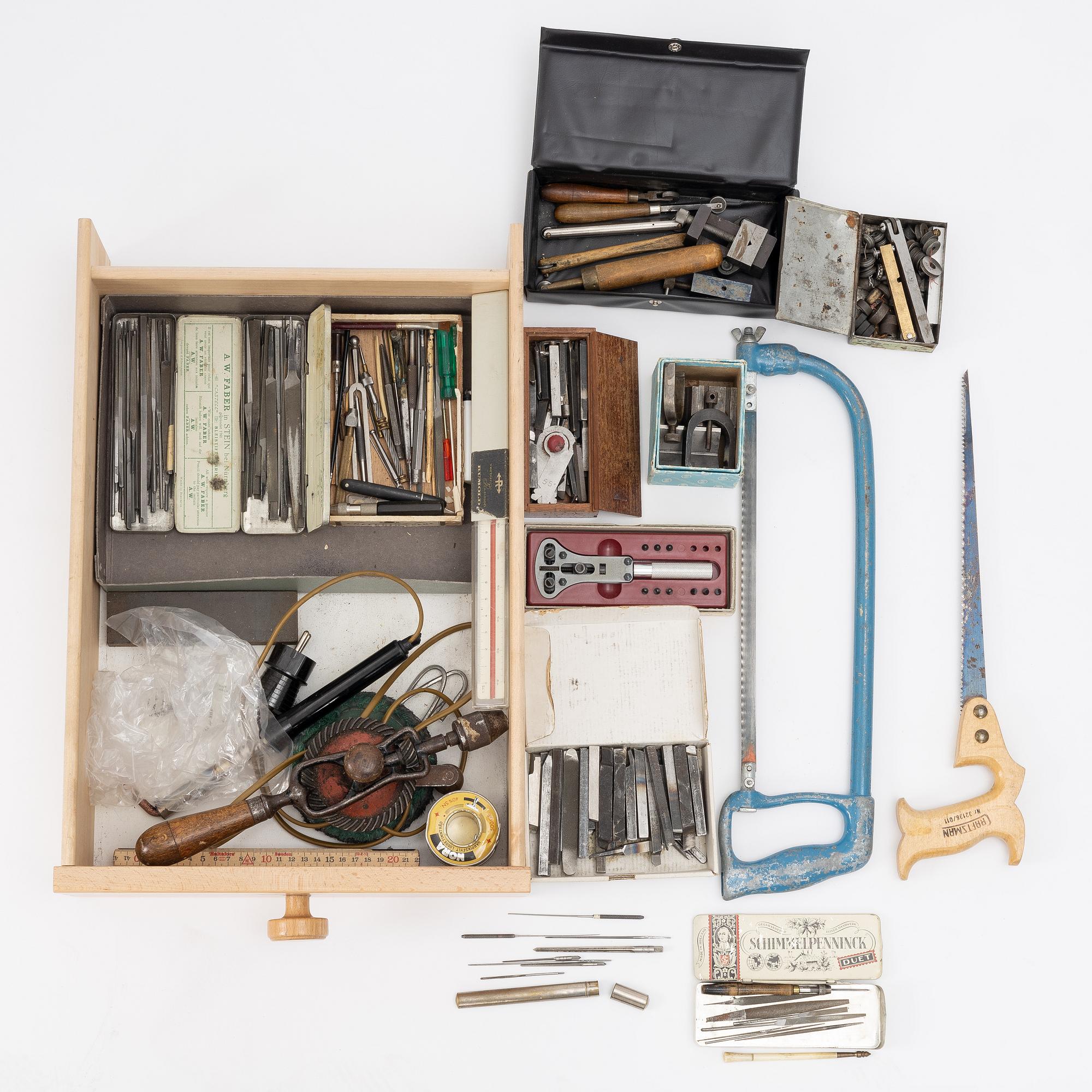 Watchmaking tools and spare parts, including a lathe by Lorch.