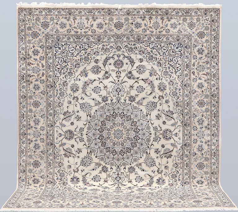 A Nain part silk carpet, 269 x 213 cm.