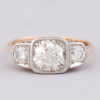 A RING, old cut diamond, brilliant cut diamonds, 14K gold. Westerback, Helsinki Finland 1958.