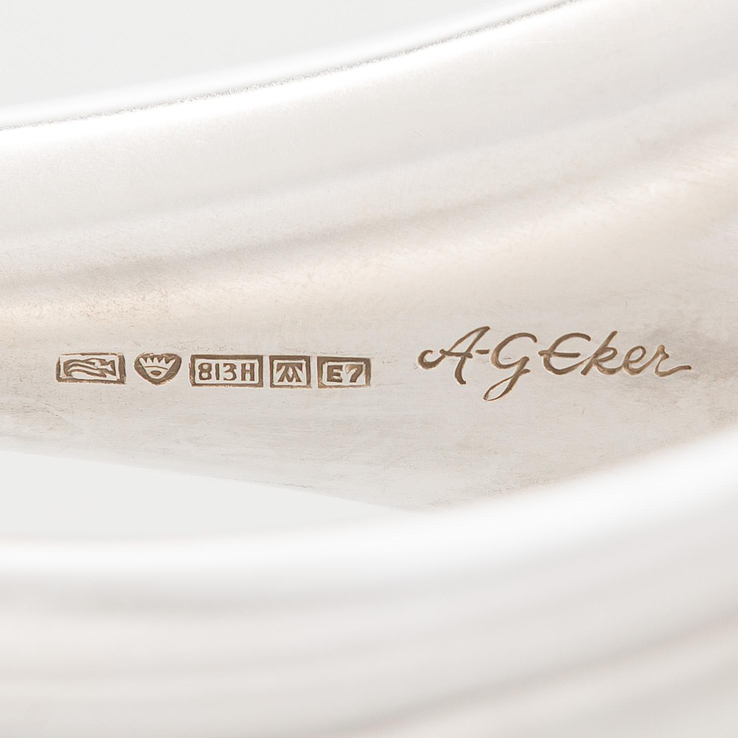 Anna-Greta Eker, Kynttilänjalkoja, 3 kpl, hopeaa, Auran Kultaseppä oy, Turku 1958 ja 1961.