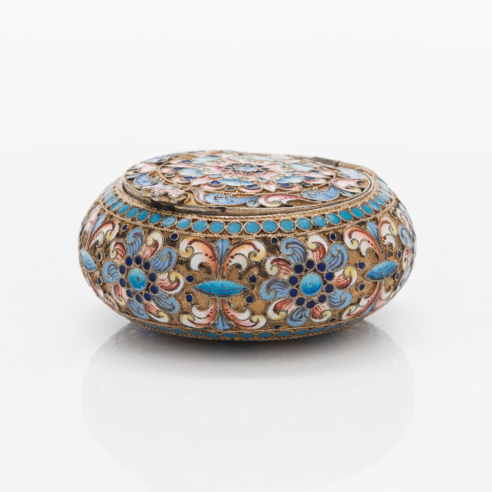 A gilt silver cloisonné enamel pill box, maker's mark of D. Nikitin, Moscow 1908-17.