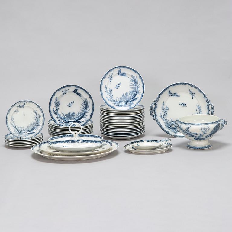 A 42-piece set of Arabia faience dinnerware, late 19th century.