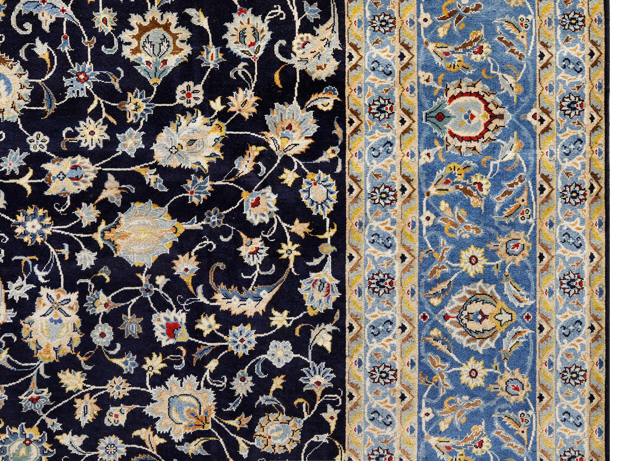 A Kashan carpet of 'Shah Abbas' design, c 376 x 276 cm.