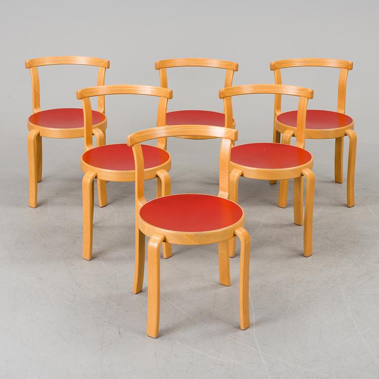 A set of six chairs by Magnus Olesen, Durup, Denmark.