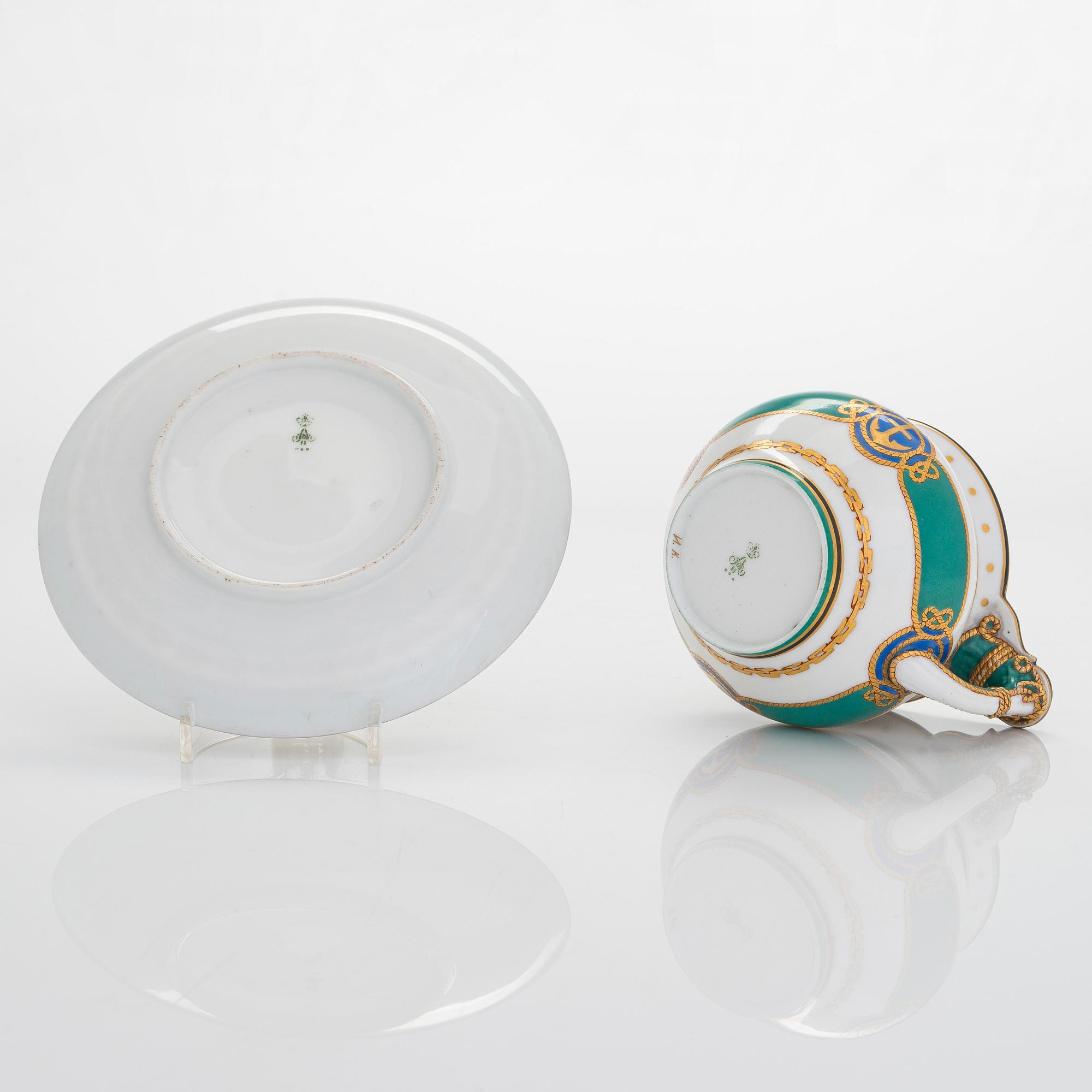 A cup and saucer from the Derzhava service, Imperial Porcelain Manufactory, St. Petersburg, late 19th century.