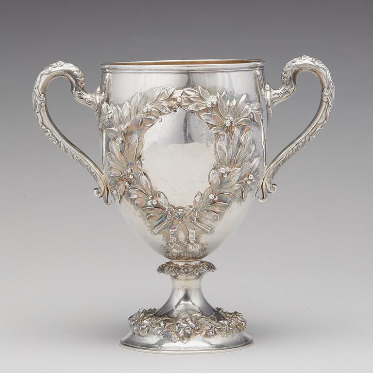 An English 19th century parcel-gilt silver cup, mark of Robert Hennell, London 1863.