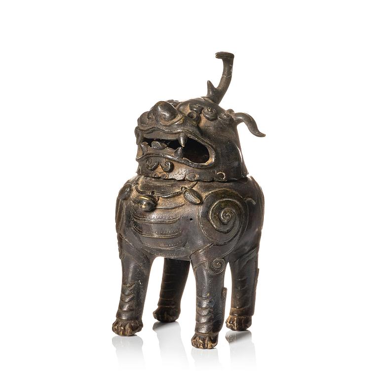 A bronze censer in the shape of a buddhist lion, Ming dynasty (1368-1644).