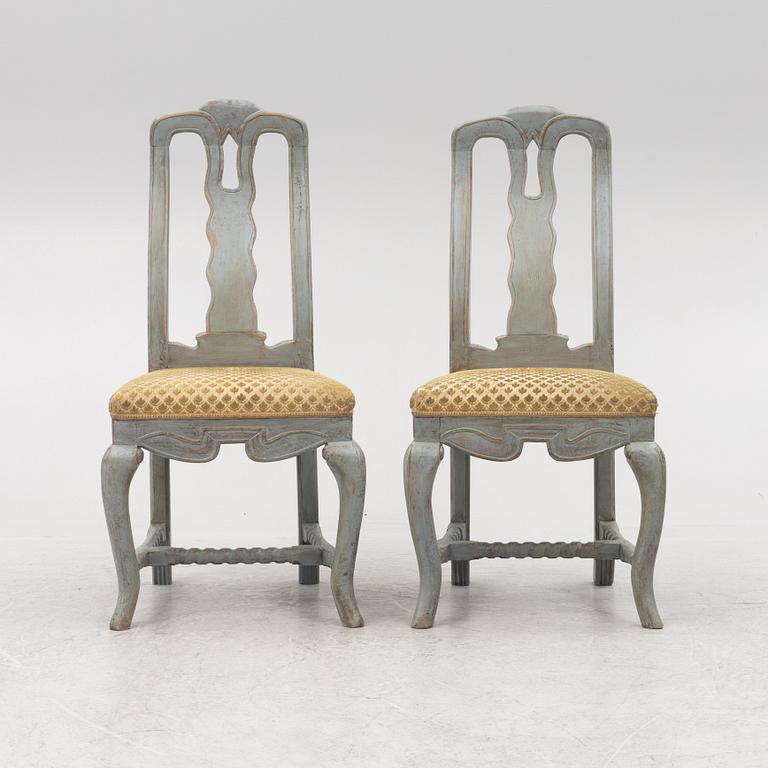 A pair of Baroque style chairs with older parts.