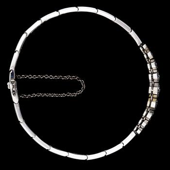 ARMBAND, 9 briljantslipade diamanter, tot. ca 1.80 ct. G. Dahlgren, Malmö, 1950-tal.