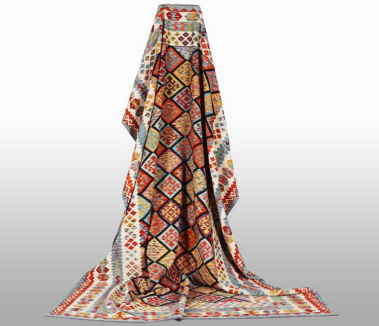 A carpet, kilim 343 x 250 cm.