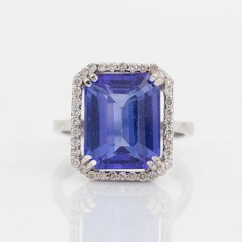 Emerald cut tanzanite and brilliant cut diamond cocktail ring.