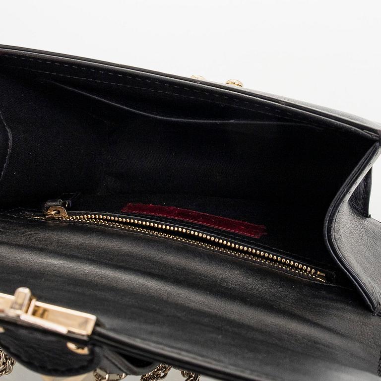 Valentino Garavani, a 'Glam Lock' bag.