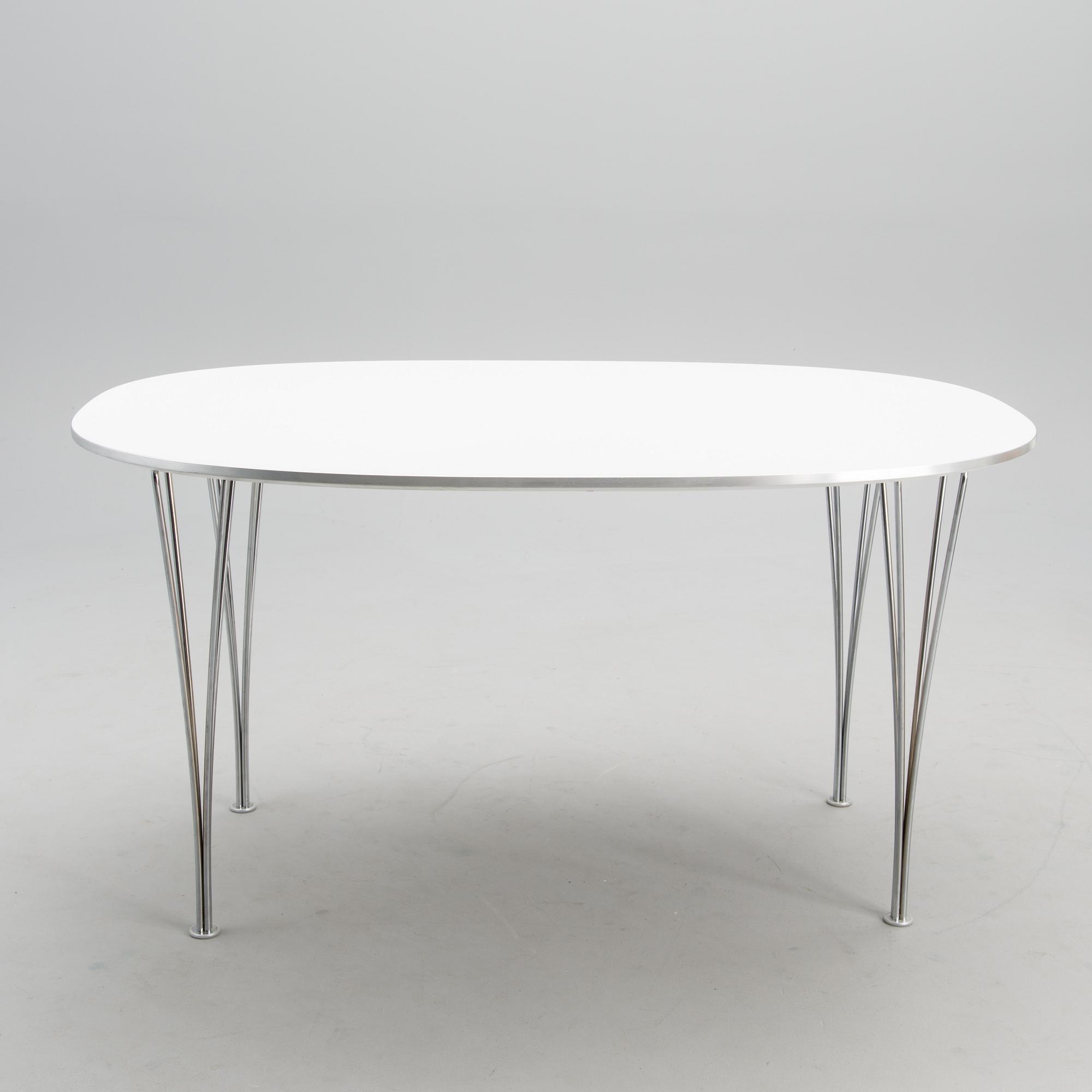 A "Superellips" table and four "Sjuan" chairs, manufacturer's labels, Fritz Hansen, Denmark.