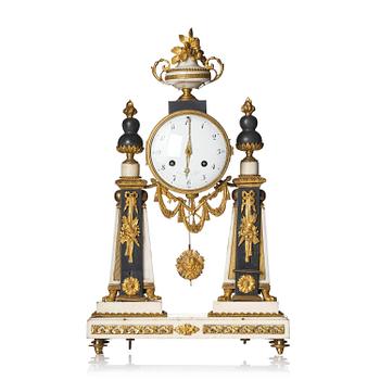 135. A marble and ormolu Louis XVI portico mantel clock, Paris, late 19th century.