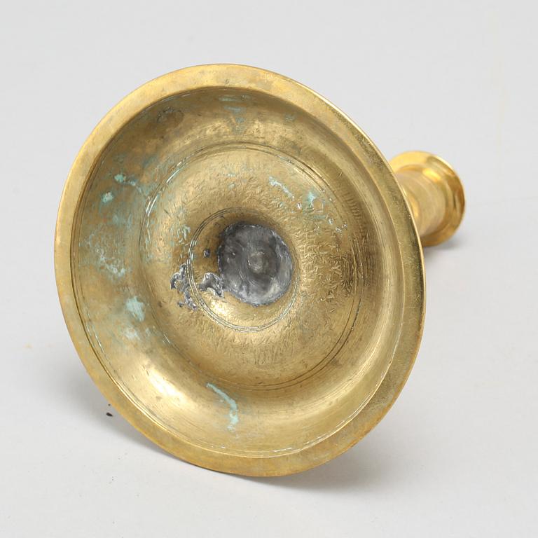 An 18th century candlestick.