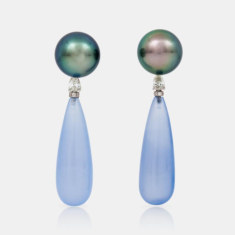 A pair of cultured Tahiti pearl, chalcedony and drop-shaped diamond earrings.