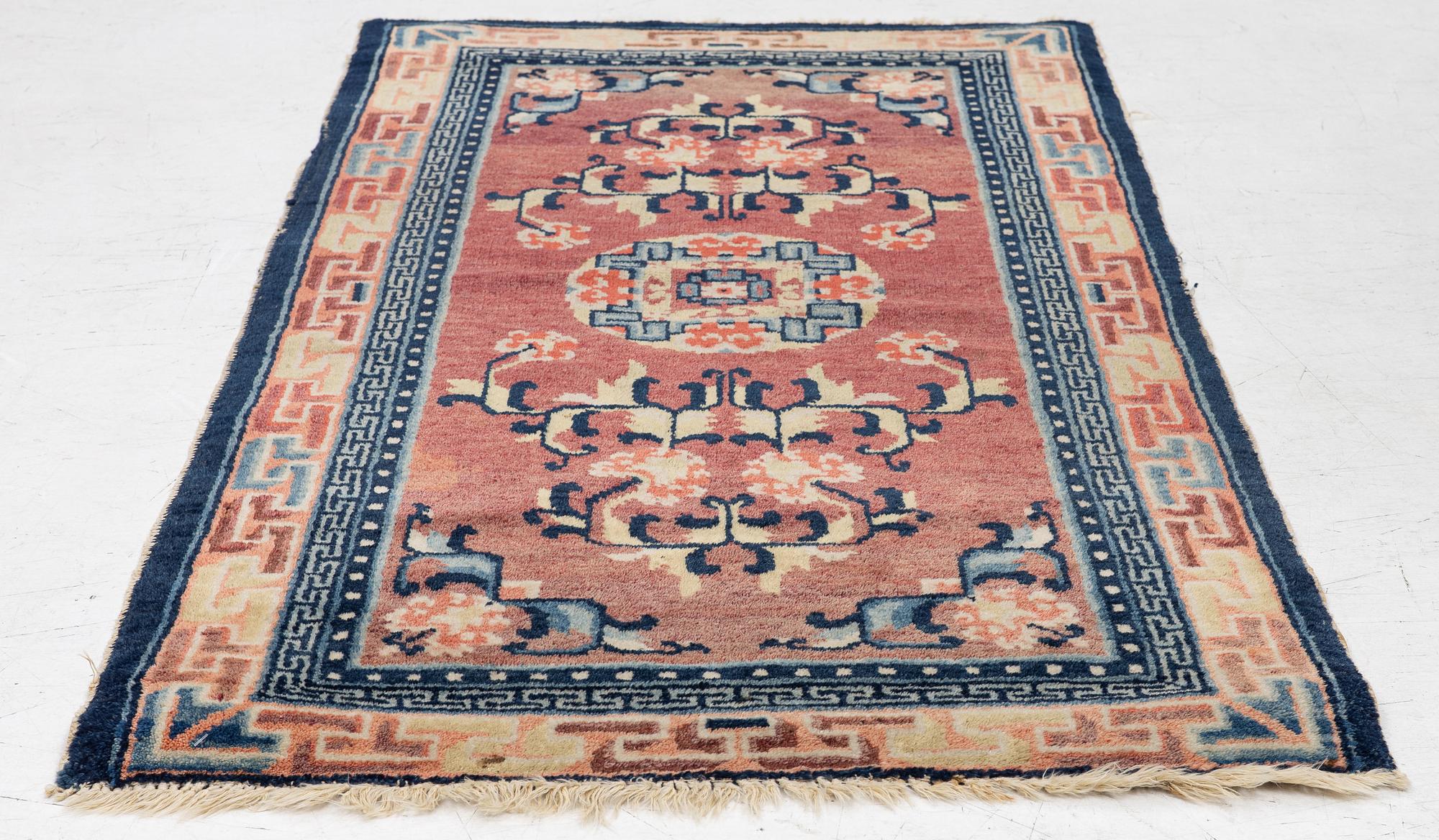Carpet, antique China, approx. 128 x 67 cm.