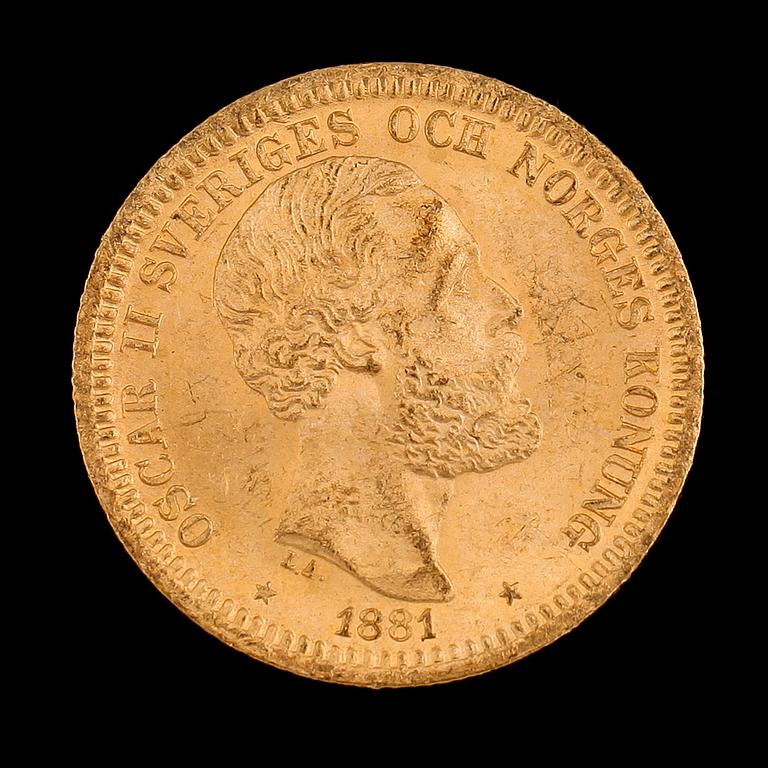 GULDMYNT, 20 kronor, Oscar II, 1881. Vikt ca 9 g.