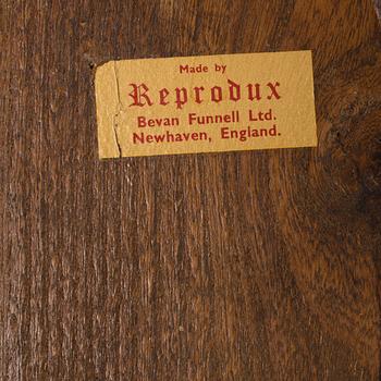 Six oak chairs from Reprodux, second half of the 20th century.